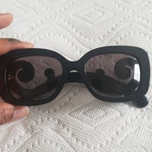 Authentic PRADA sunglasses (code in right lense)